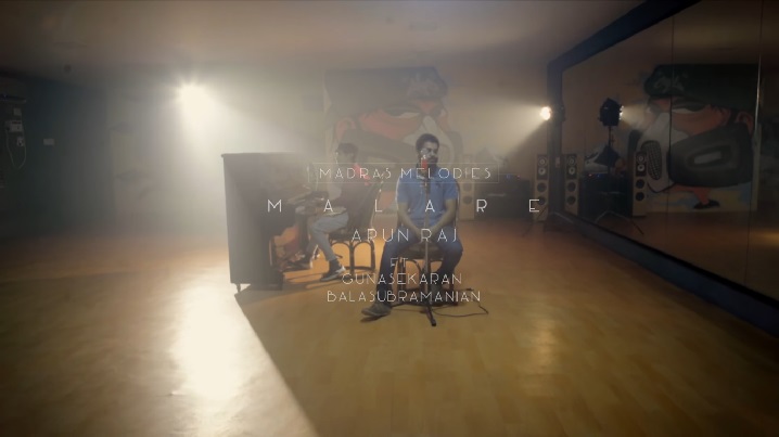 Malare Song Lyrics image