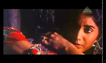 Enmael Vizhundha Song Lyrics image