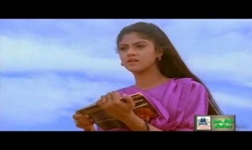 Malaiyoram Veesum Kaatru Song Lyrics