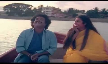 Muthamizh Kaviyae Song Lyrics image