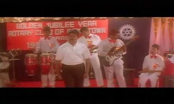 Oru Mani Adithaal Song Lyrics image