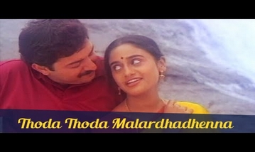Thoda Thoda Malarnthadhenna Song Lyrics image