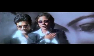 Thottal Poo Malarum Song Lyrics image
